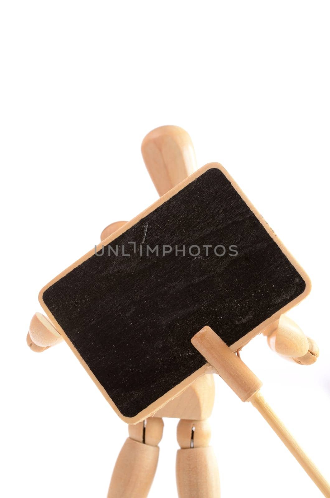 Wooden man holding a blackboard with space for text