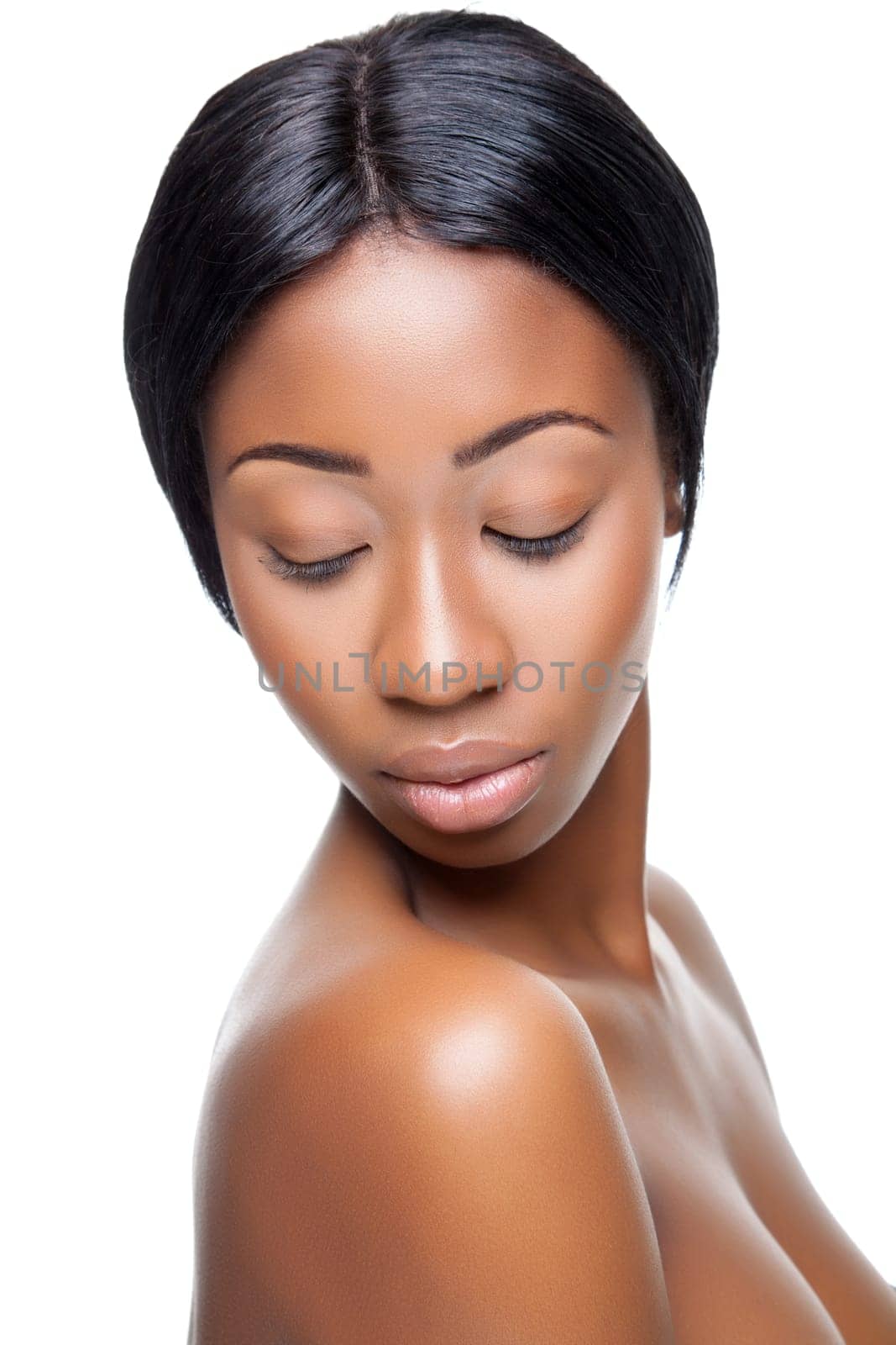 Perfect black beauty closeup on white