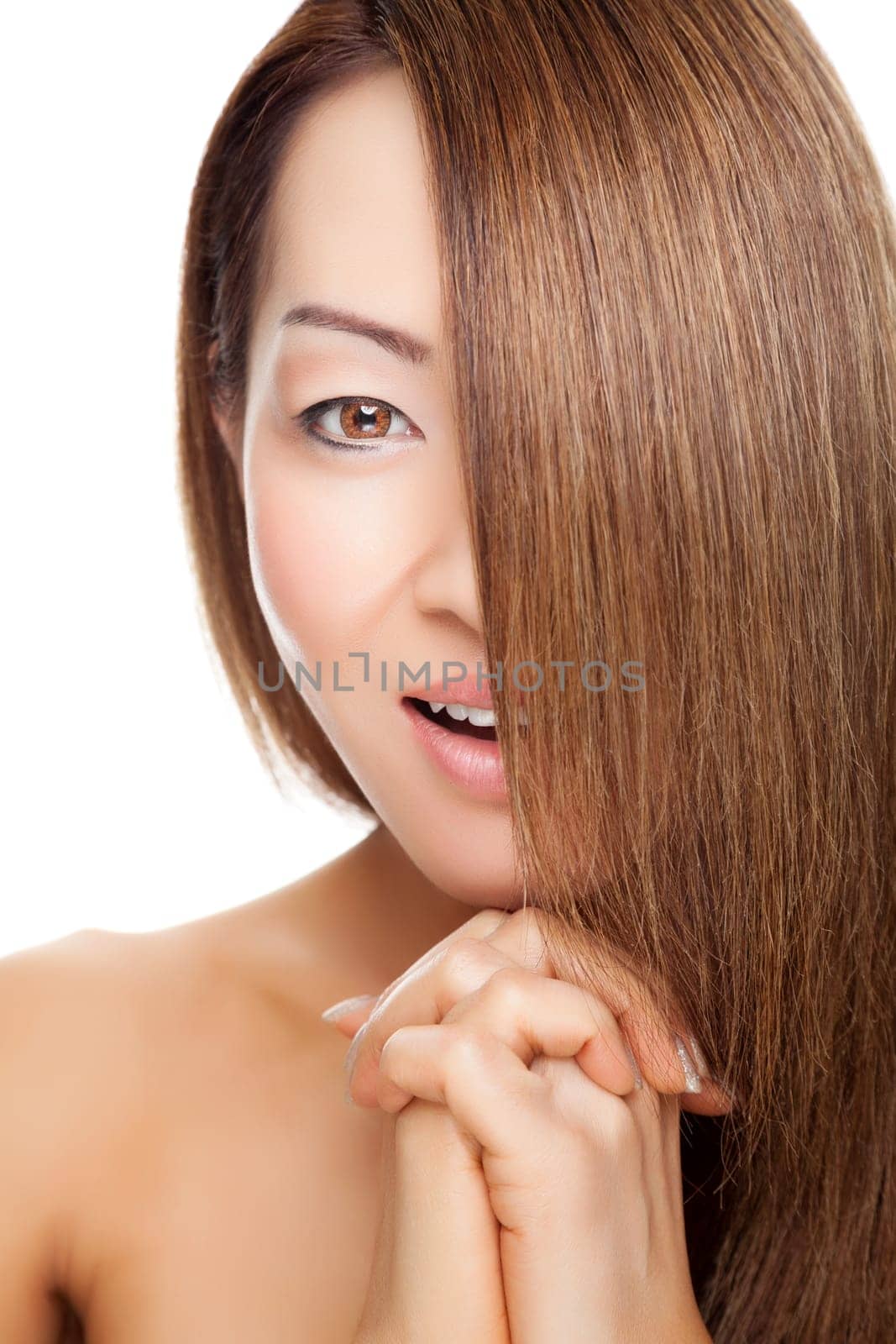 Beautiful young Thai woman with long elegant straight hair