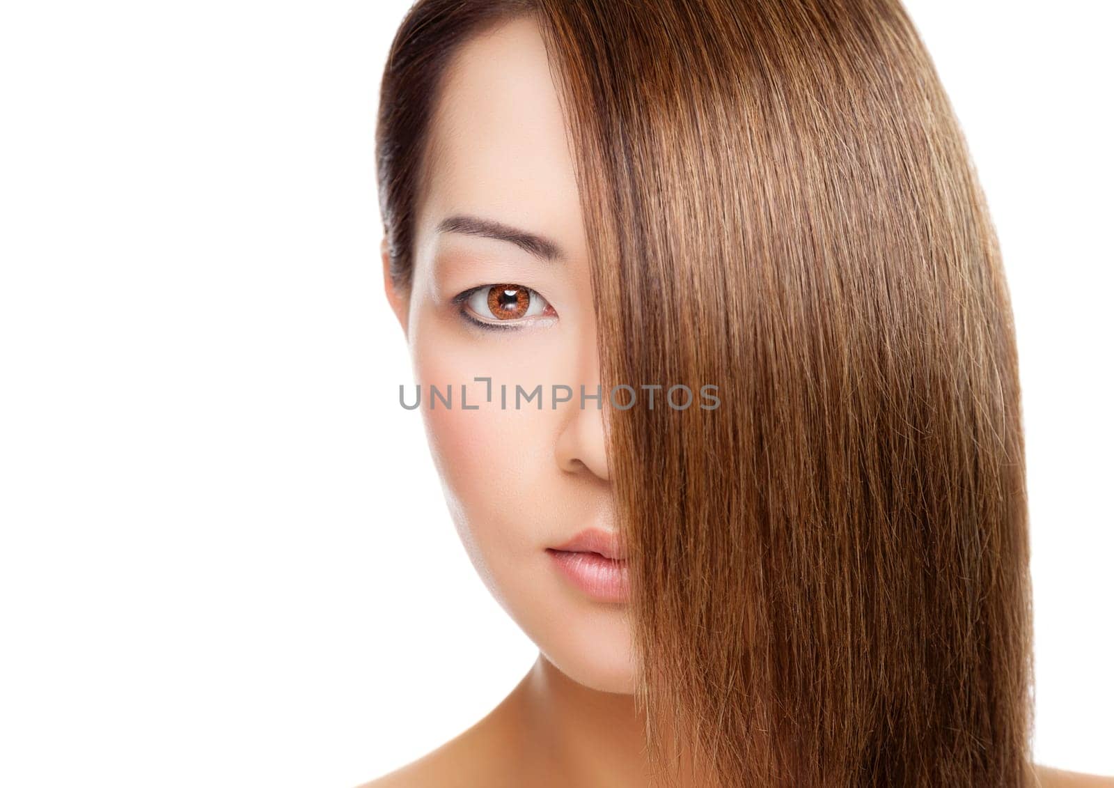 Beautiful young Thai woman with long elegant straight hair