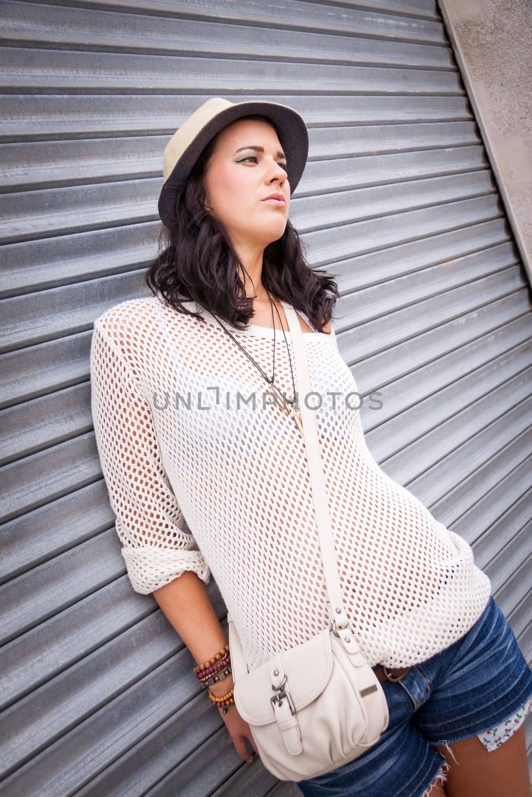 Young woman with hat in summer casual fashion lifestyle leisure portrait