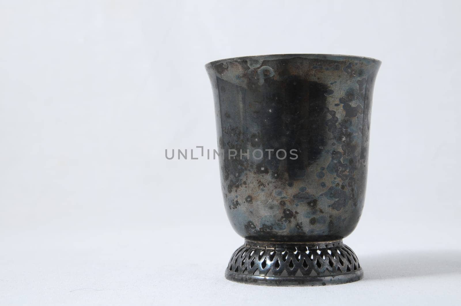 An Ancient Glass made of Siver Isolated on a White Background