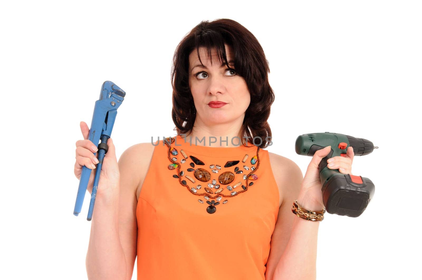 a nice woman with screwdriver and wrench isolated on the background