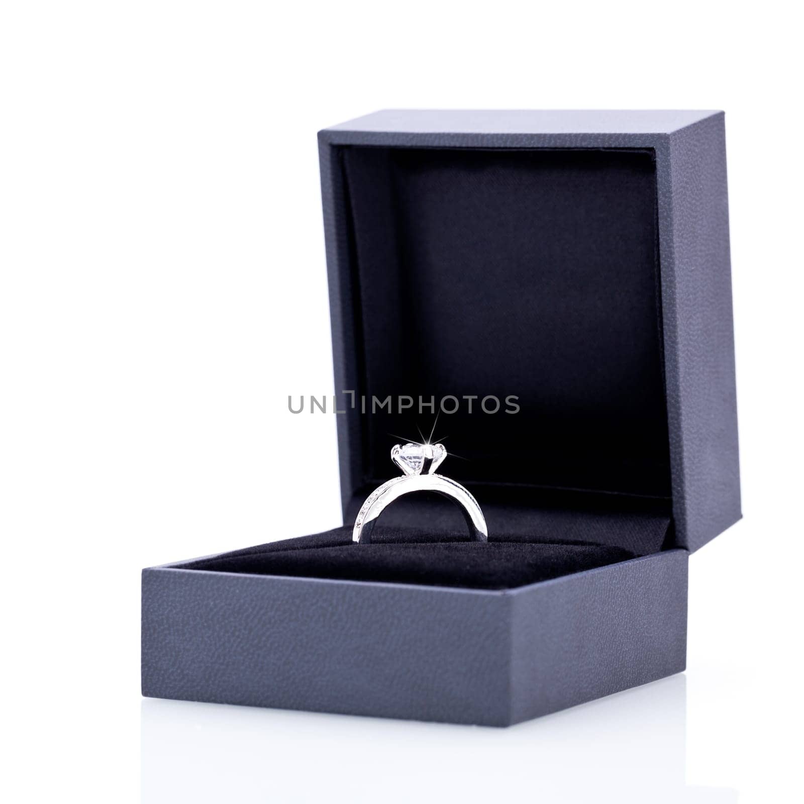 Beautiful modern elegant silver jewelry ring in a noble jewelry box box detail macro