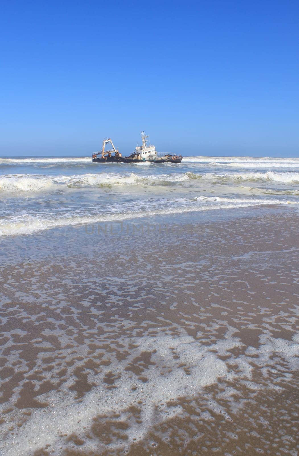 Shipwreck on a beach, Skeleton Coast, Namibia