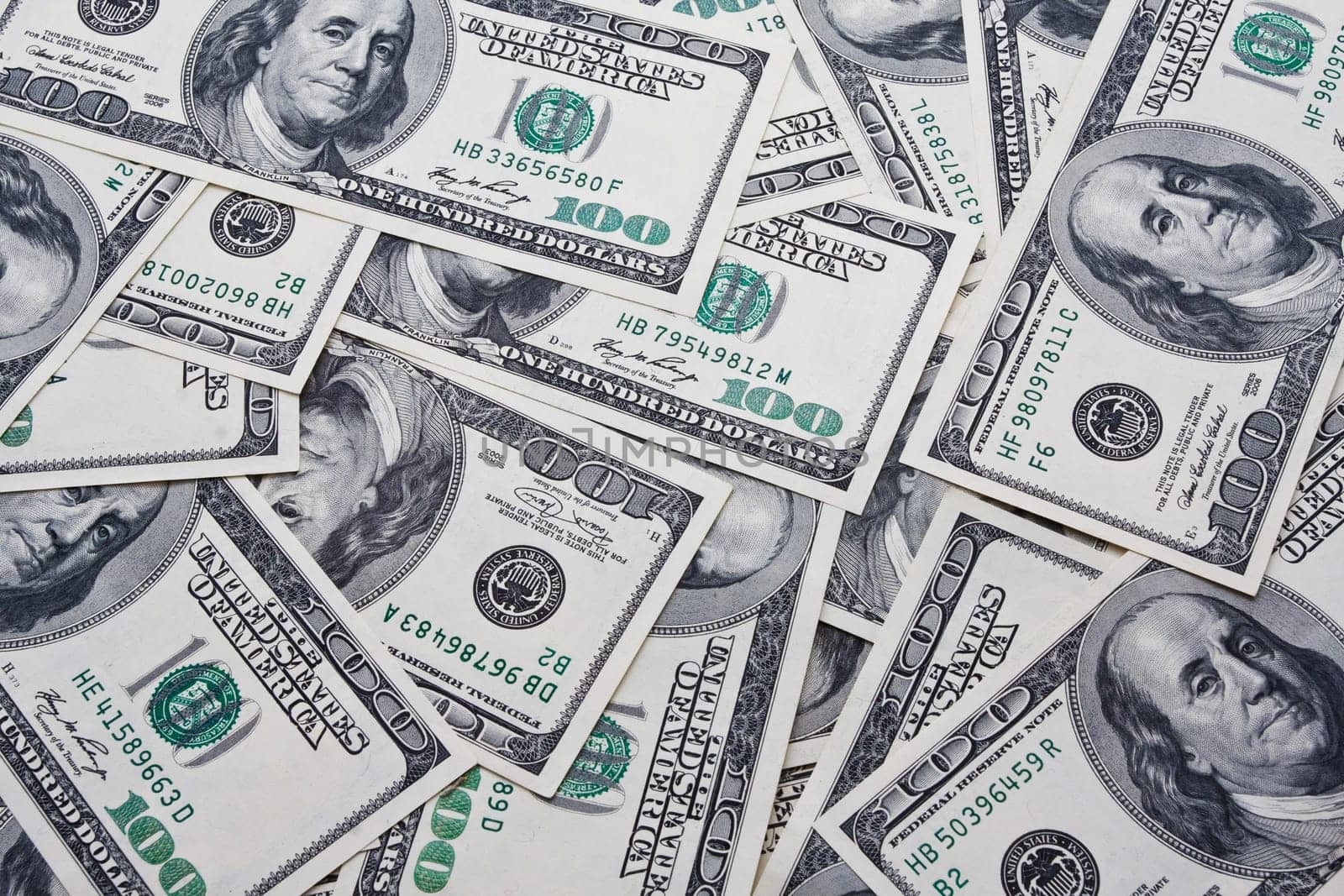 Lots of dollar notes arranged in chaotic manner, background