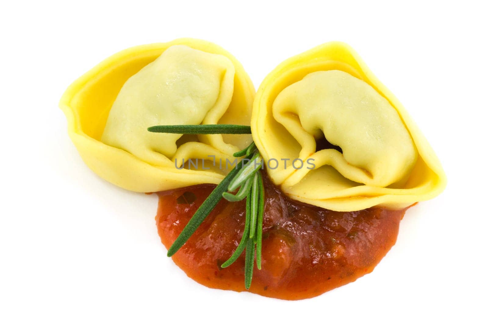 Tortelloni with sugo,close-up of Italian pasta on a white background