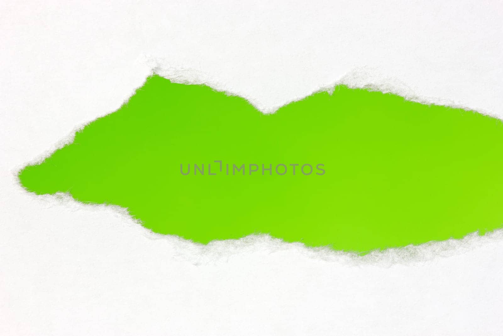 Torn white paper with green space for your text