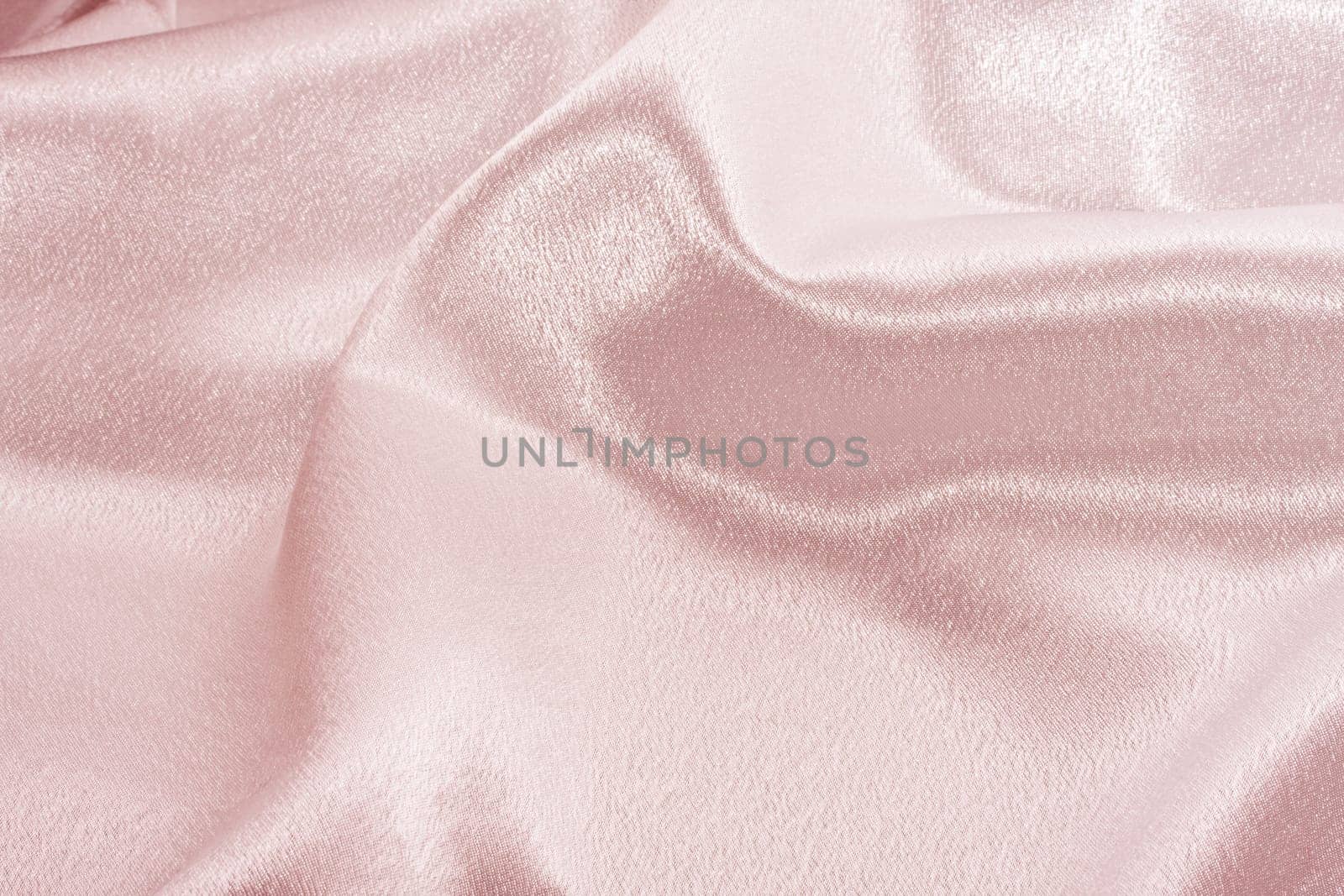 Background pink silk fabric with beautiful waves