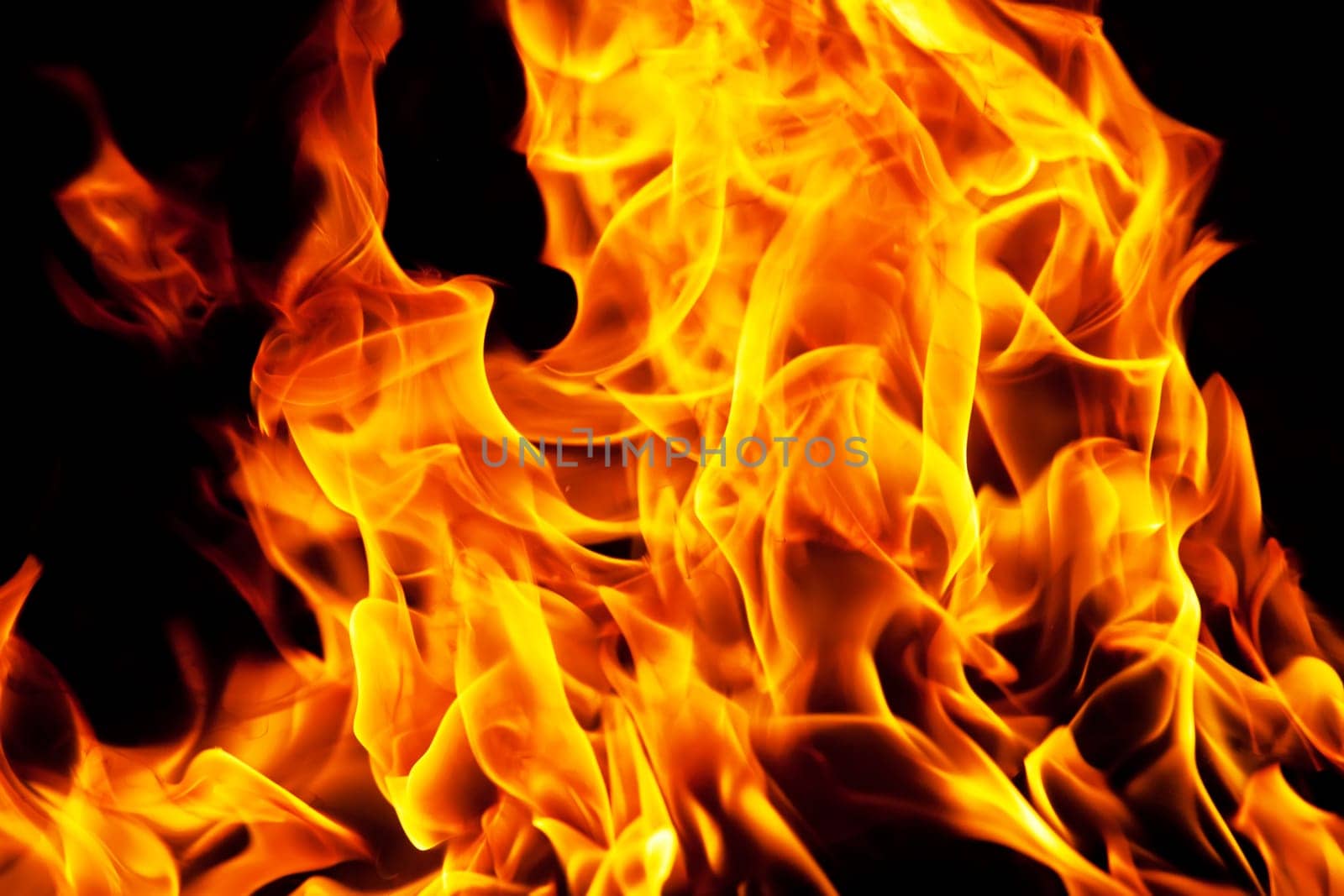 Beautiful yellow and orange hot fire on black background