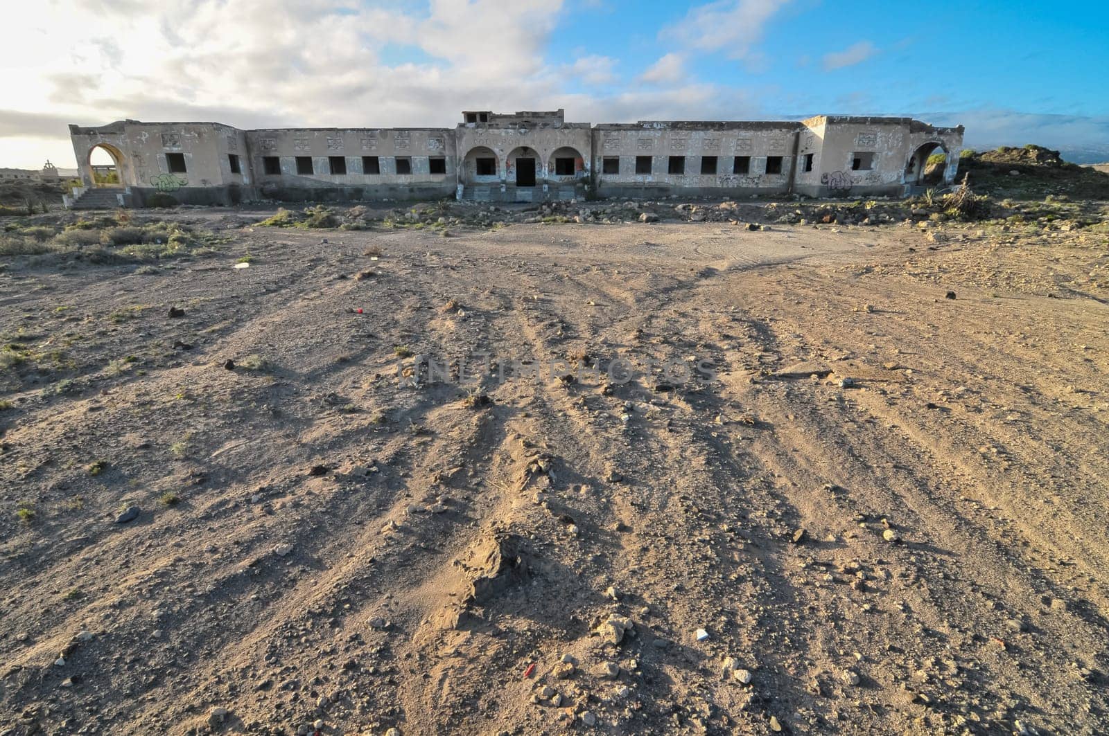 Abandoned Buildings of a Military Base at Sunset