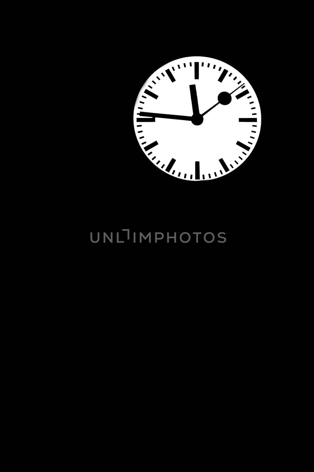 The photograph of the dial of an insulated wall clock.