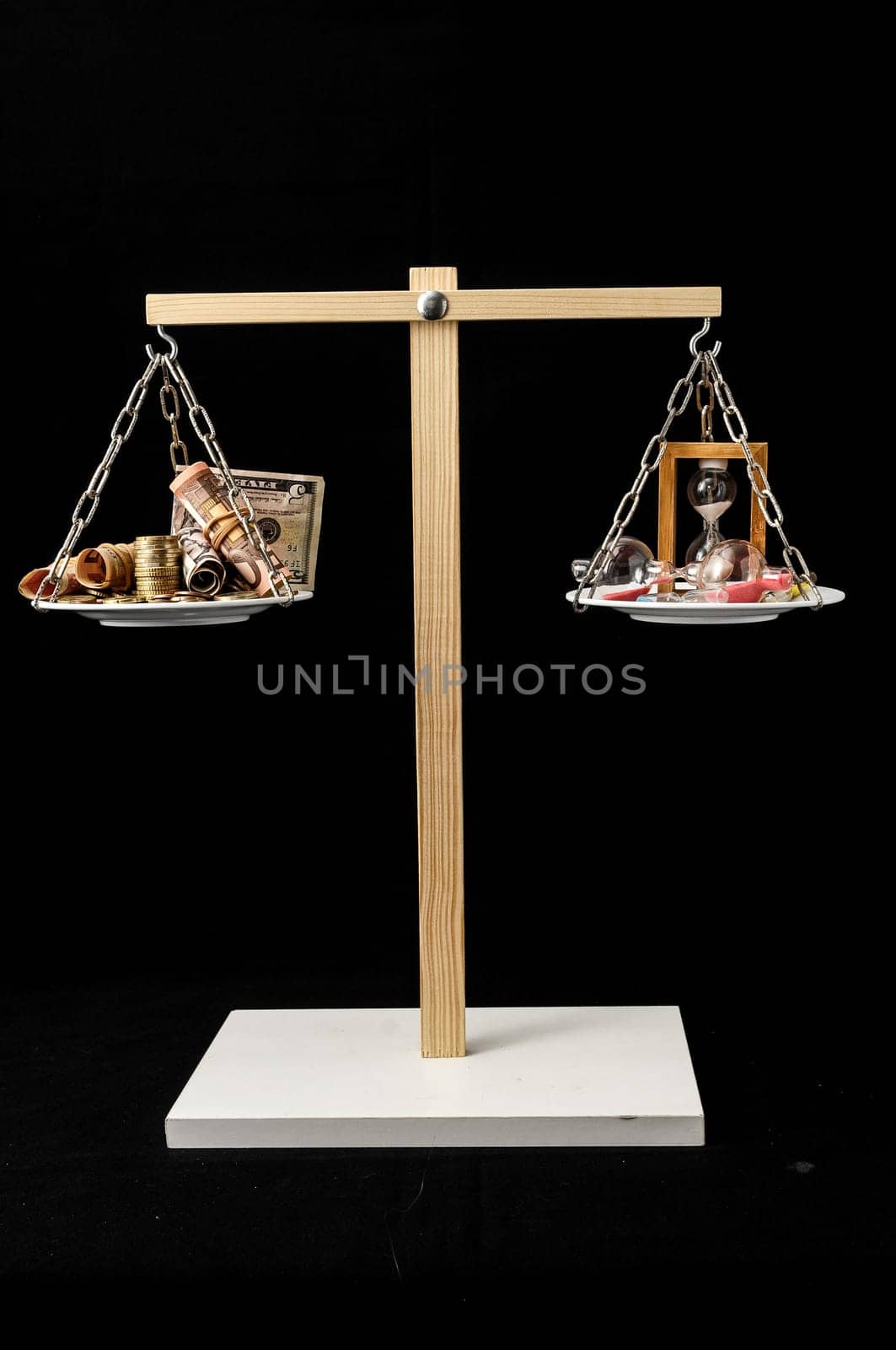 Time is Money Concept Clock and Currency on a Two Pan Balance