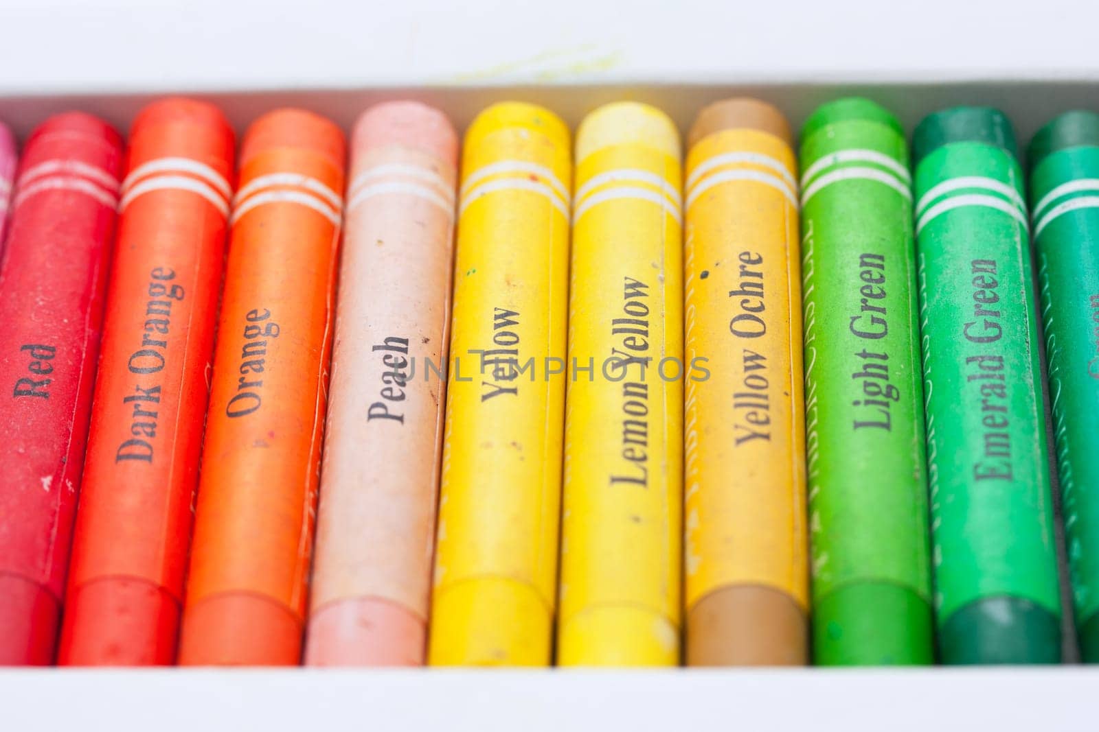 Close up photo of bright multicolored pastels