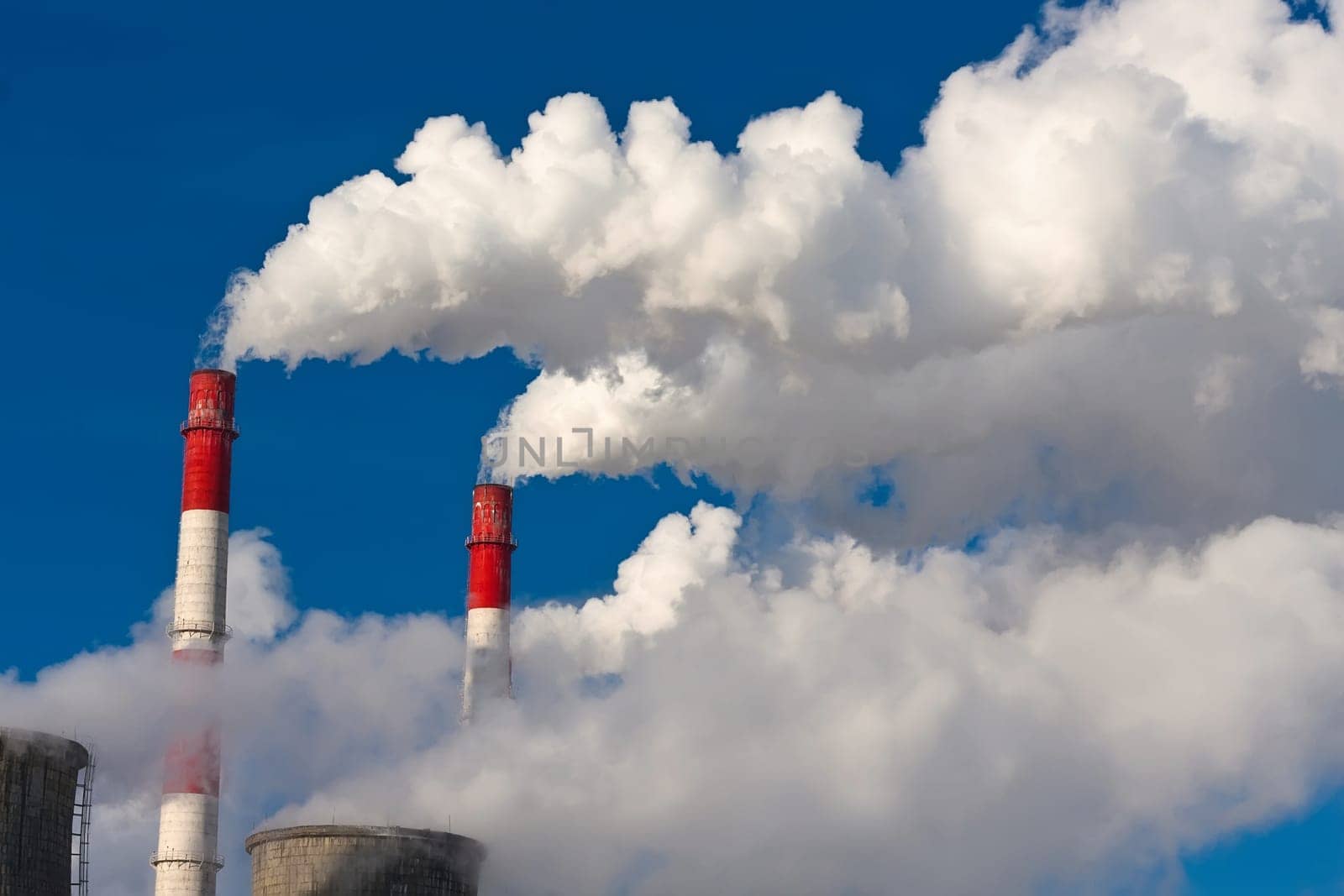 Industrial smoke rising from Power Station Cooling Towers