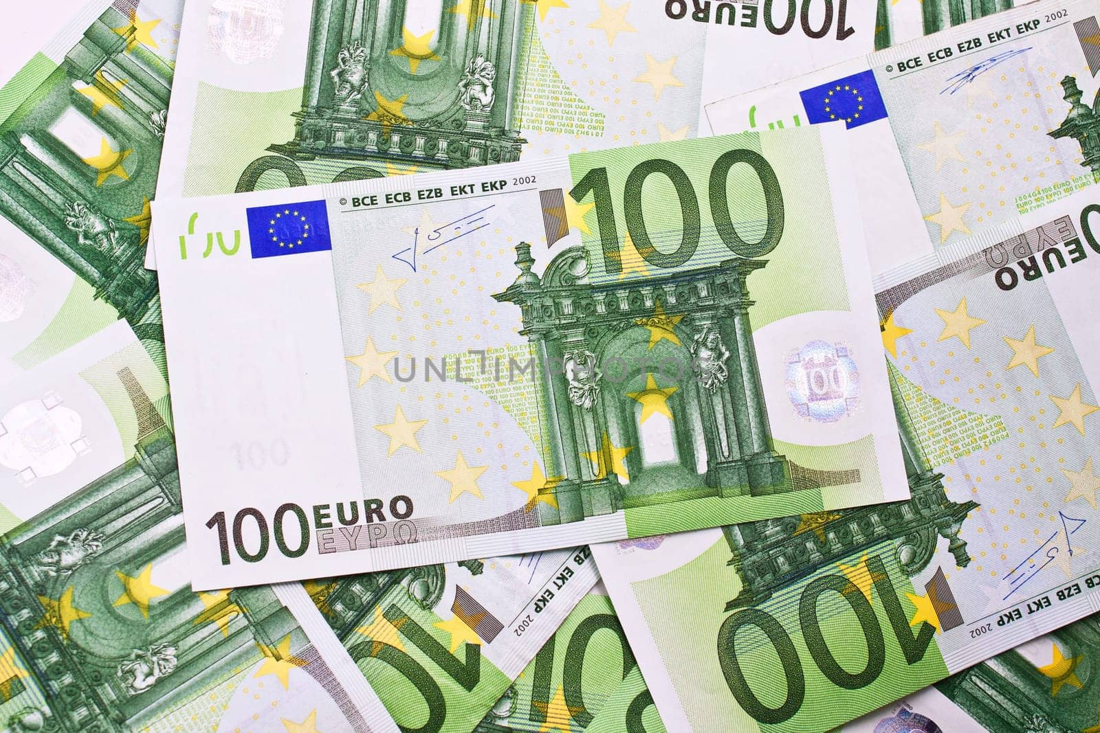 Many euro banknotes making european currency background