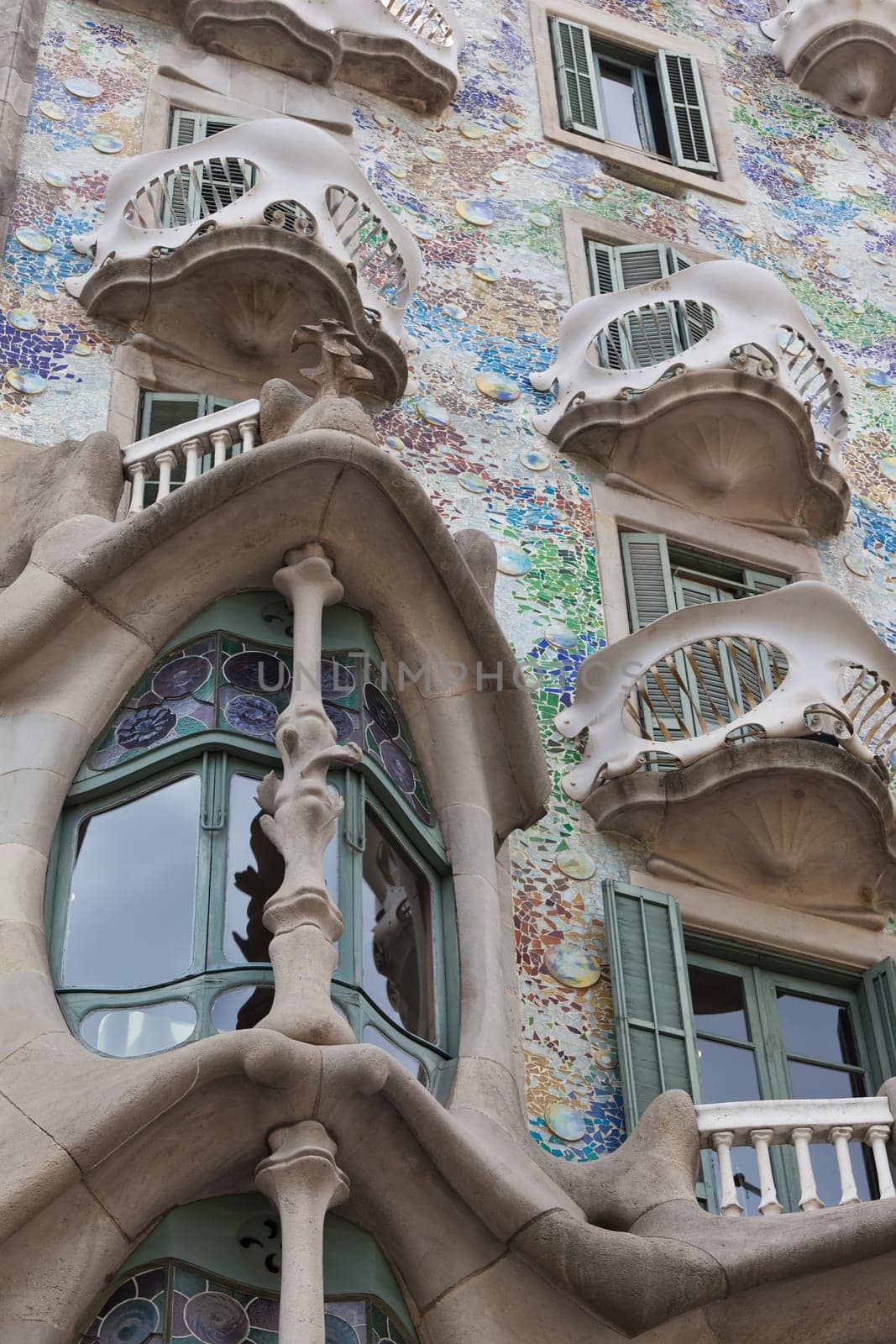 Facade of famous house Casa Batllo  by Antoni Gaudi, Barcelona, Spain