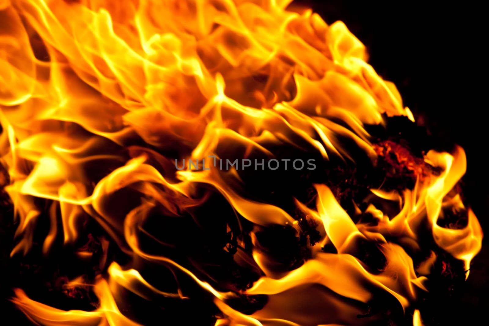 Beautiful yellow and orange hot fire on black background