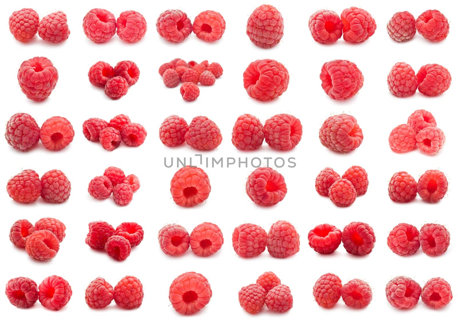 Collection of ripe red raspberries isolated on white background