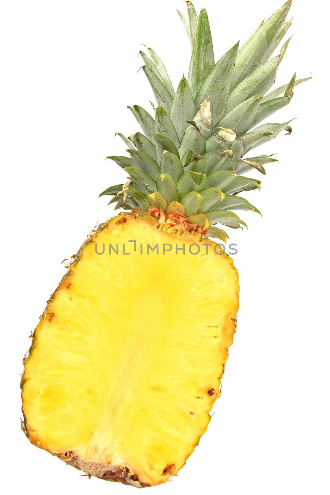 Halved pineapple (Ananas comosus,Ananas sativus) exposed against a white background
