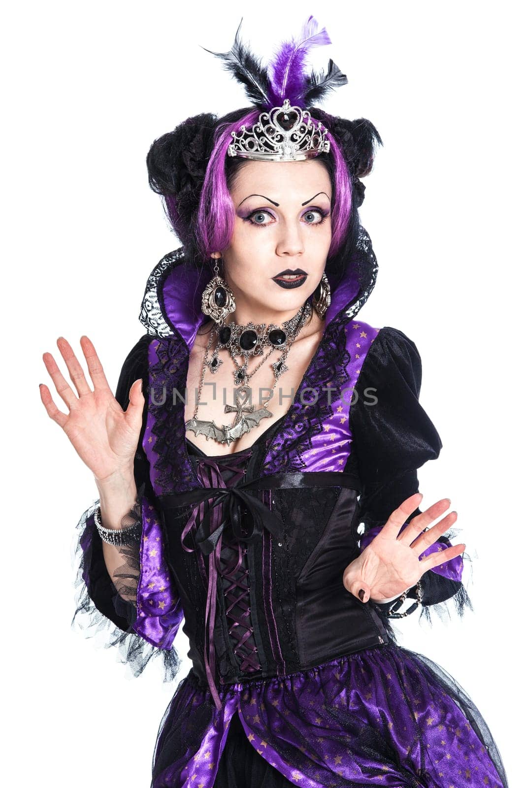 Young goth girl dressing a weird clothes in violet tones