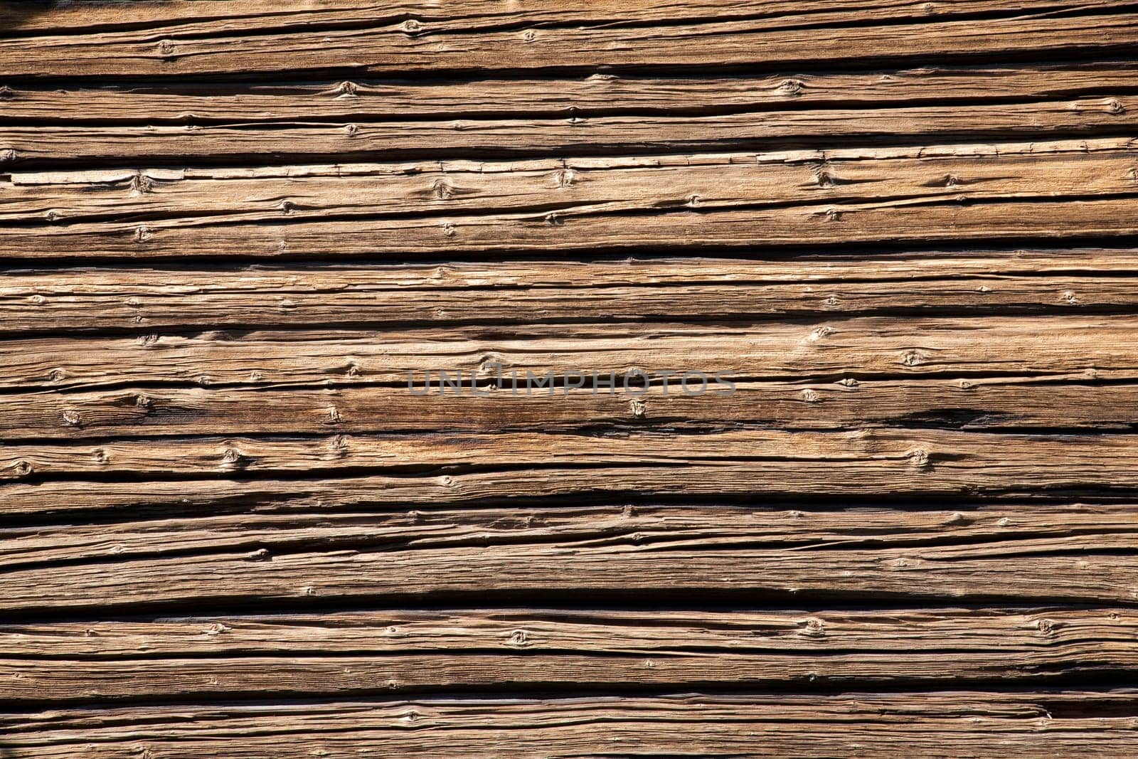 Textured background of rough, weathered wood