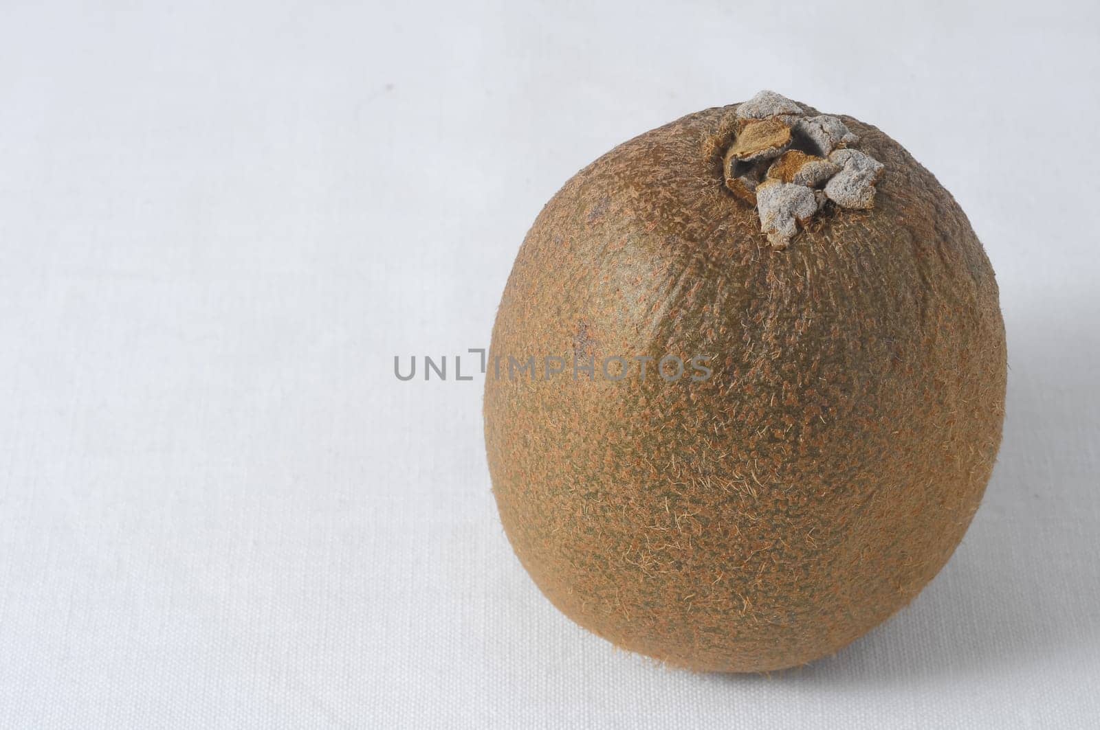 Very Ripe Healthy Kiwi on a White Background