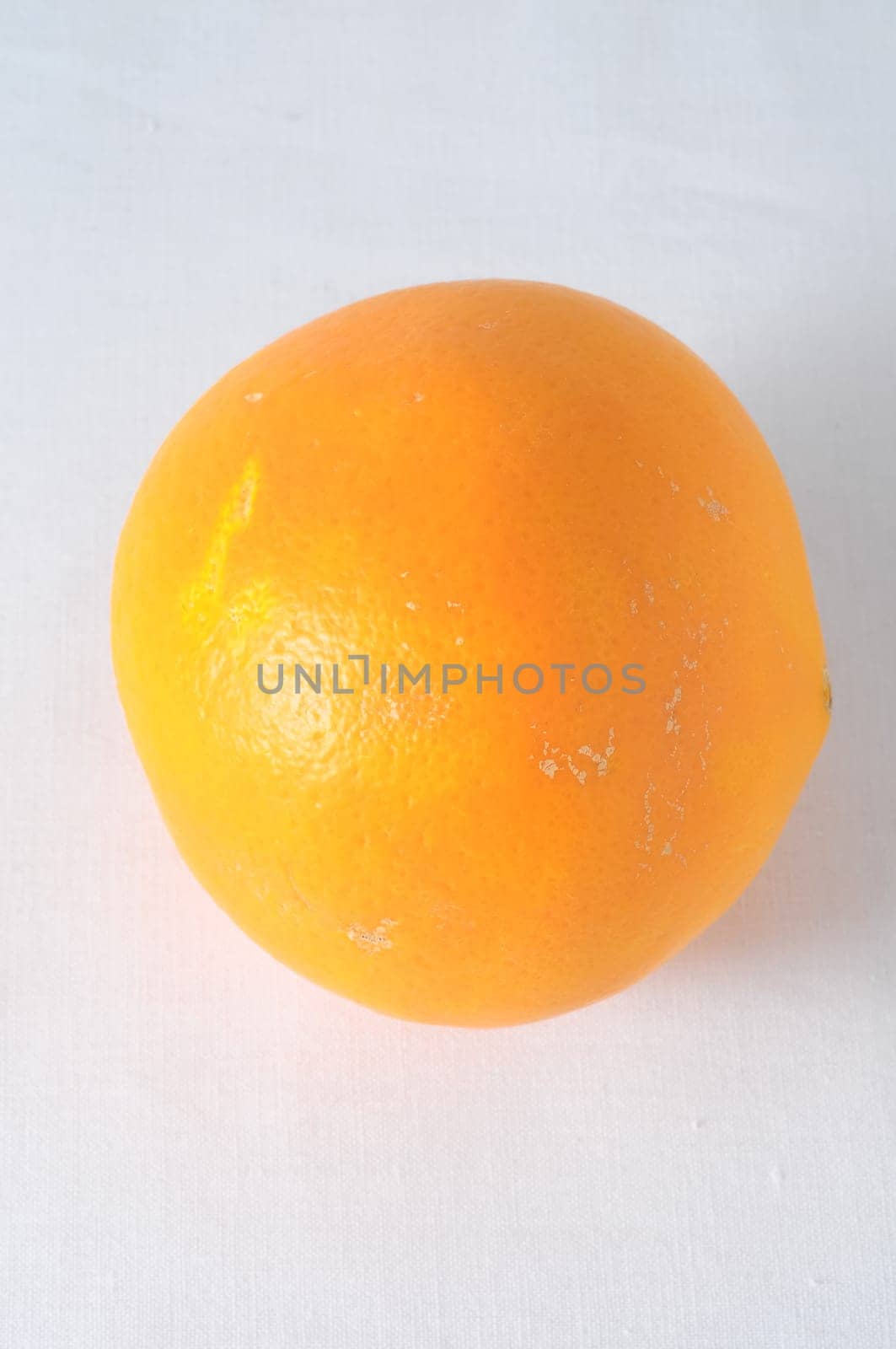 Very Ripe Healthy Orange on a White Background