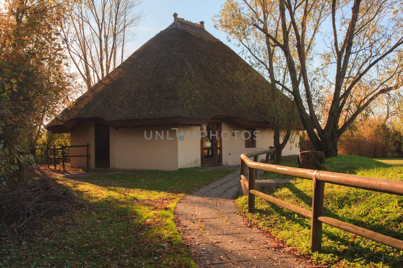 View of thatched houses in the Nature reserve of Valle canal Novo, Italy