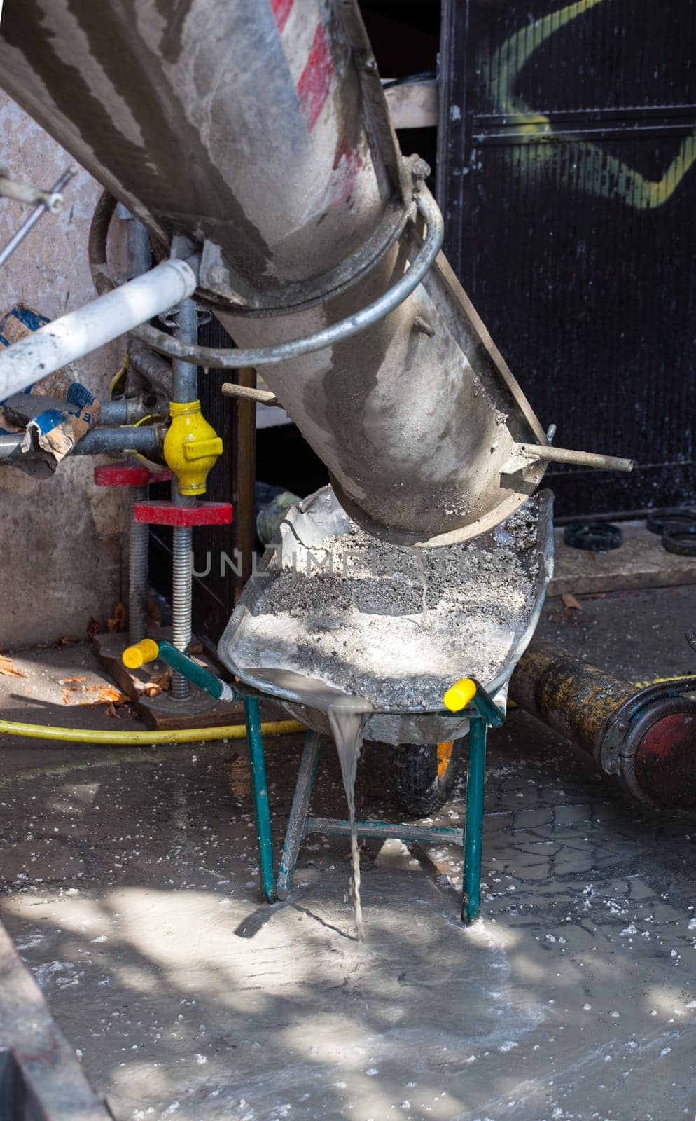 View of Cement Truck in action in a construction site