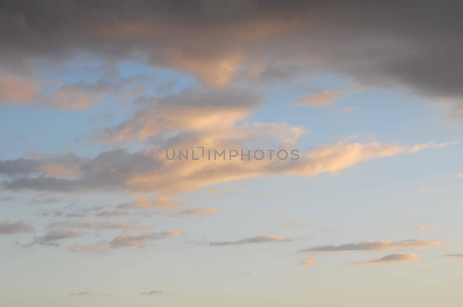 Colored Sunset Clouds Over the Atlantic Ocean in Tenerife South Spain