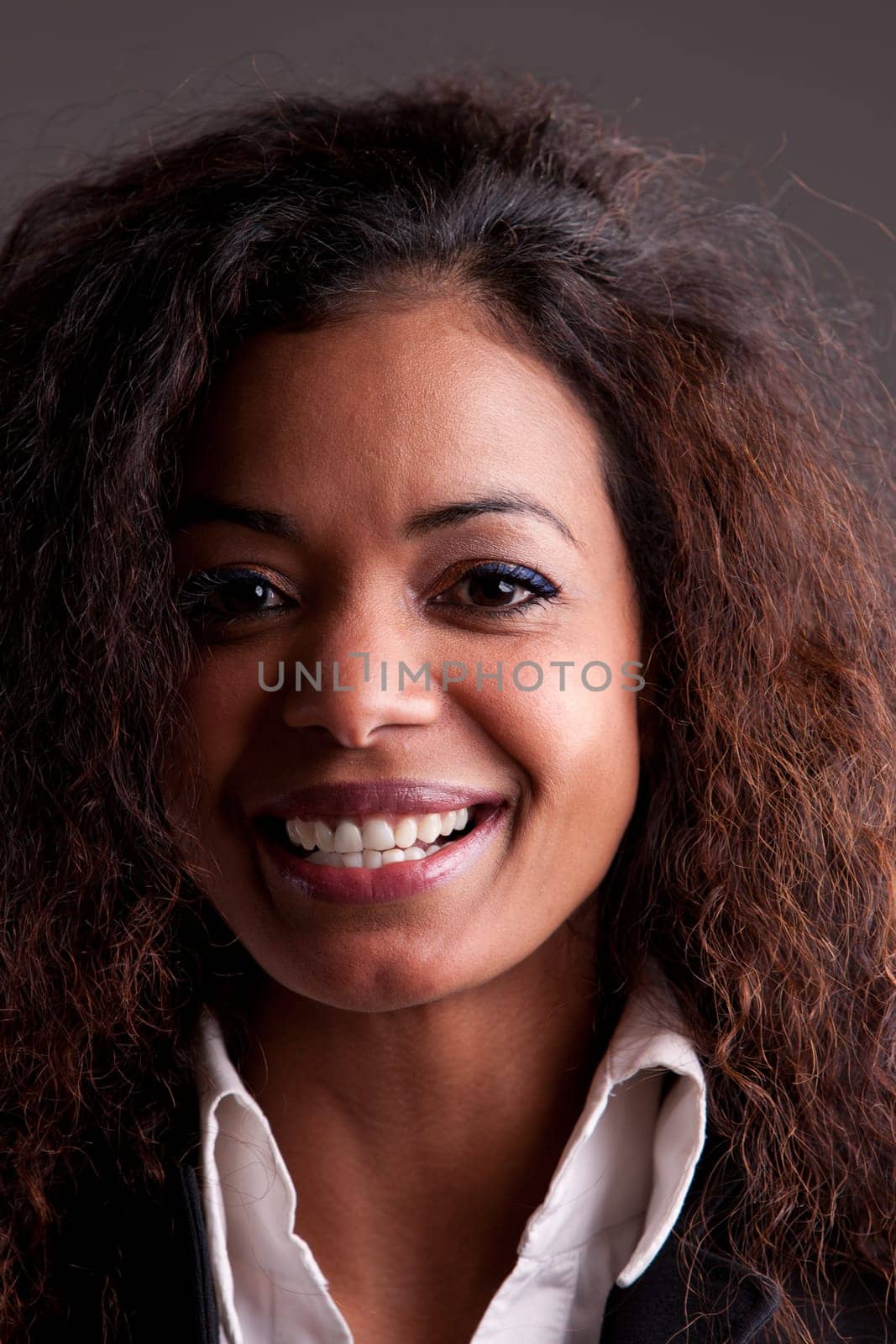 Beautiful afro businesswoman smiling