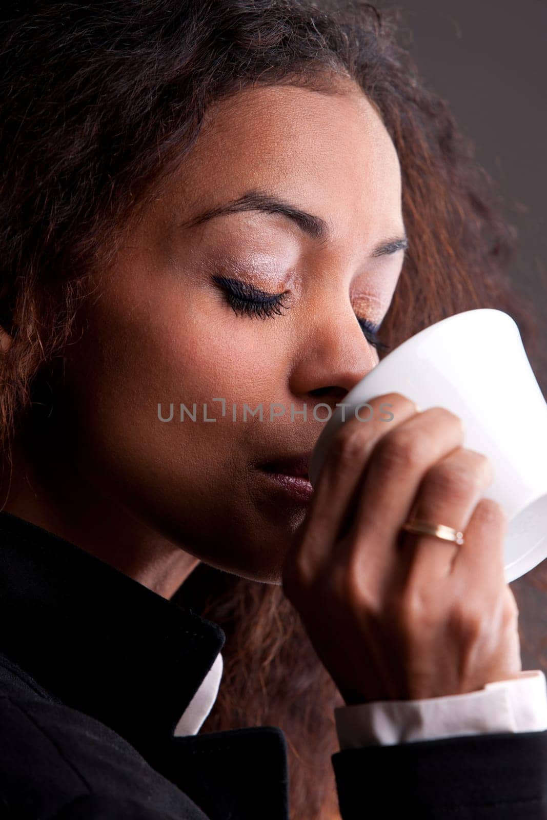Beautiful woman having a cup of coffee in relax