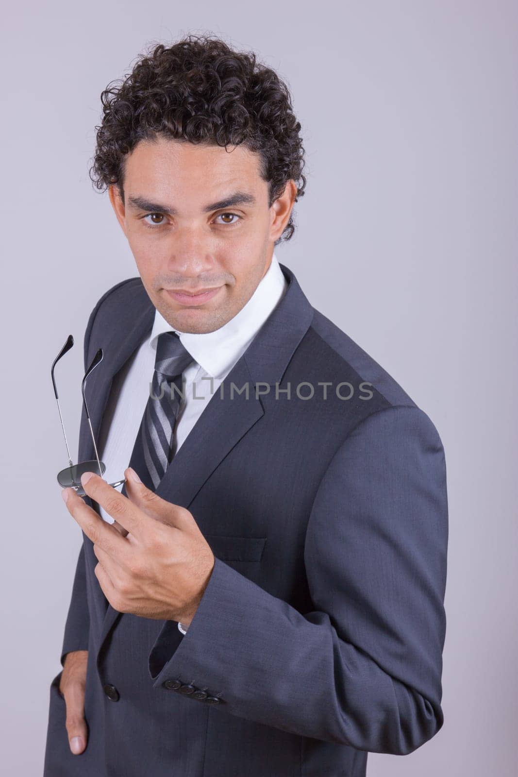 confident businessman in suit is sure in himself