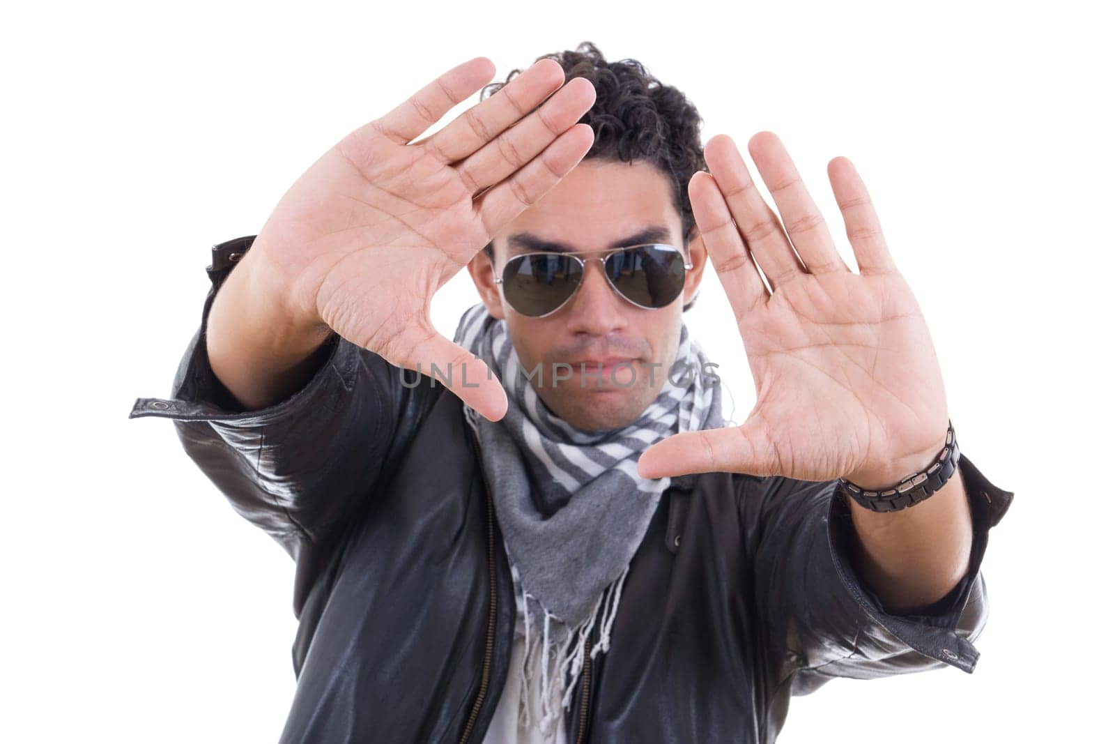 adult handsome man in a leather jacket with sunglasses zooming with his hands