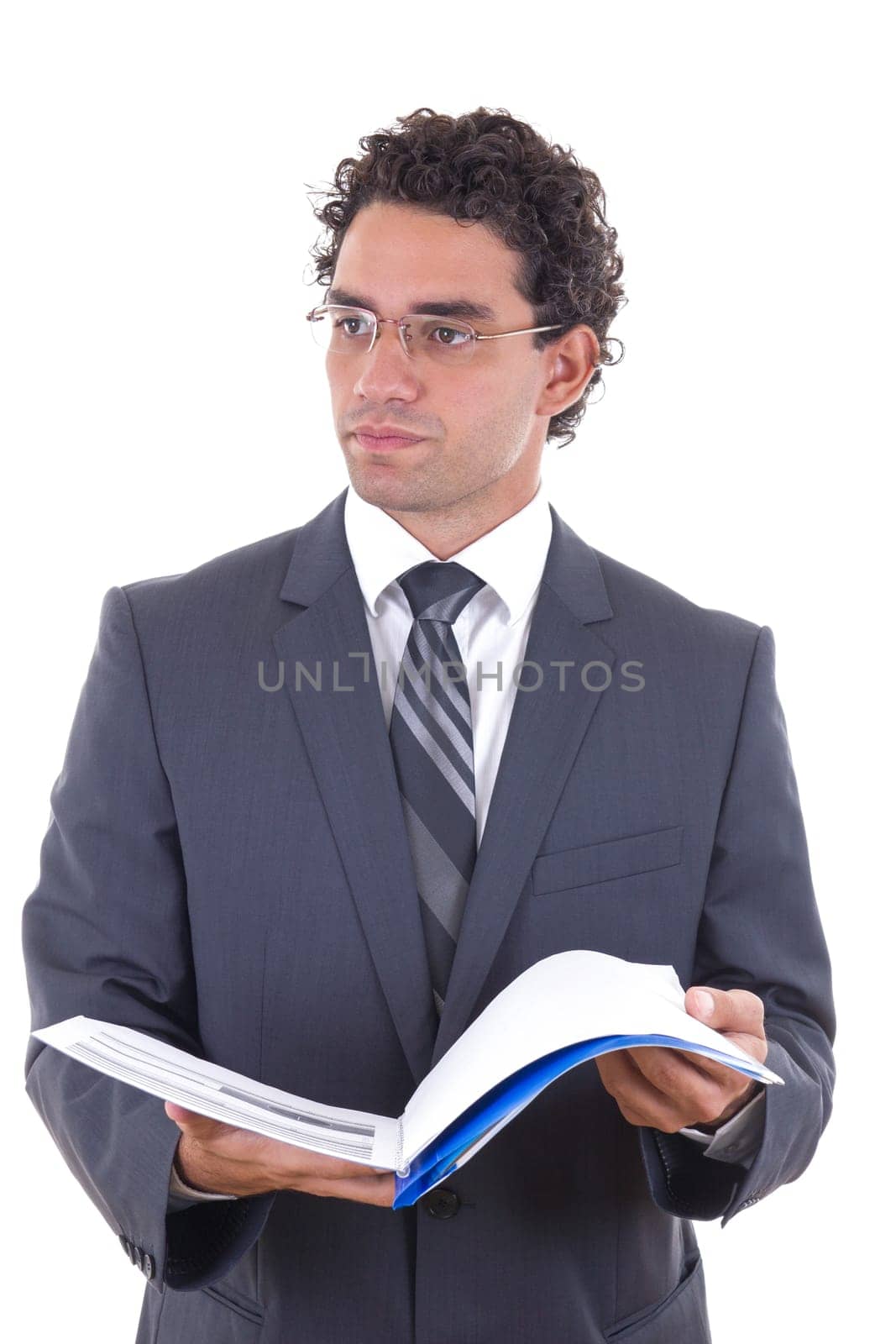 Businessman in suit holding an open notebook