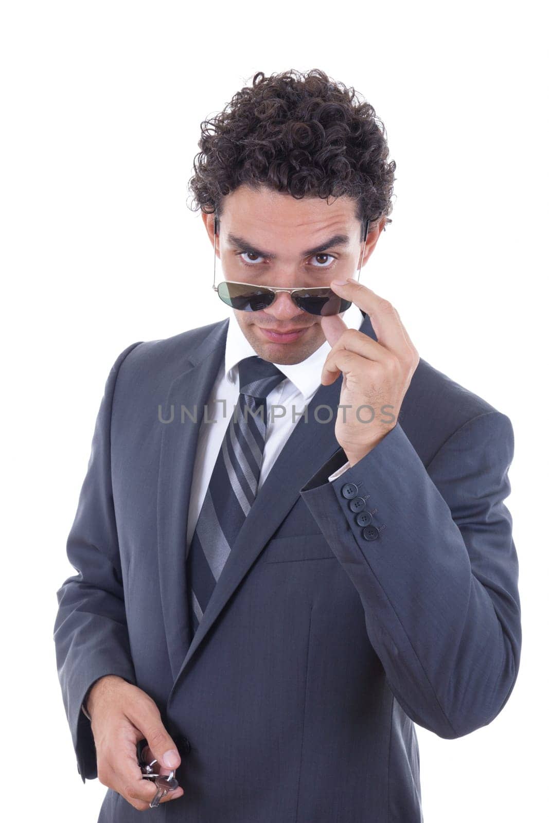 confident handsome businessman in suit with sunglasess