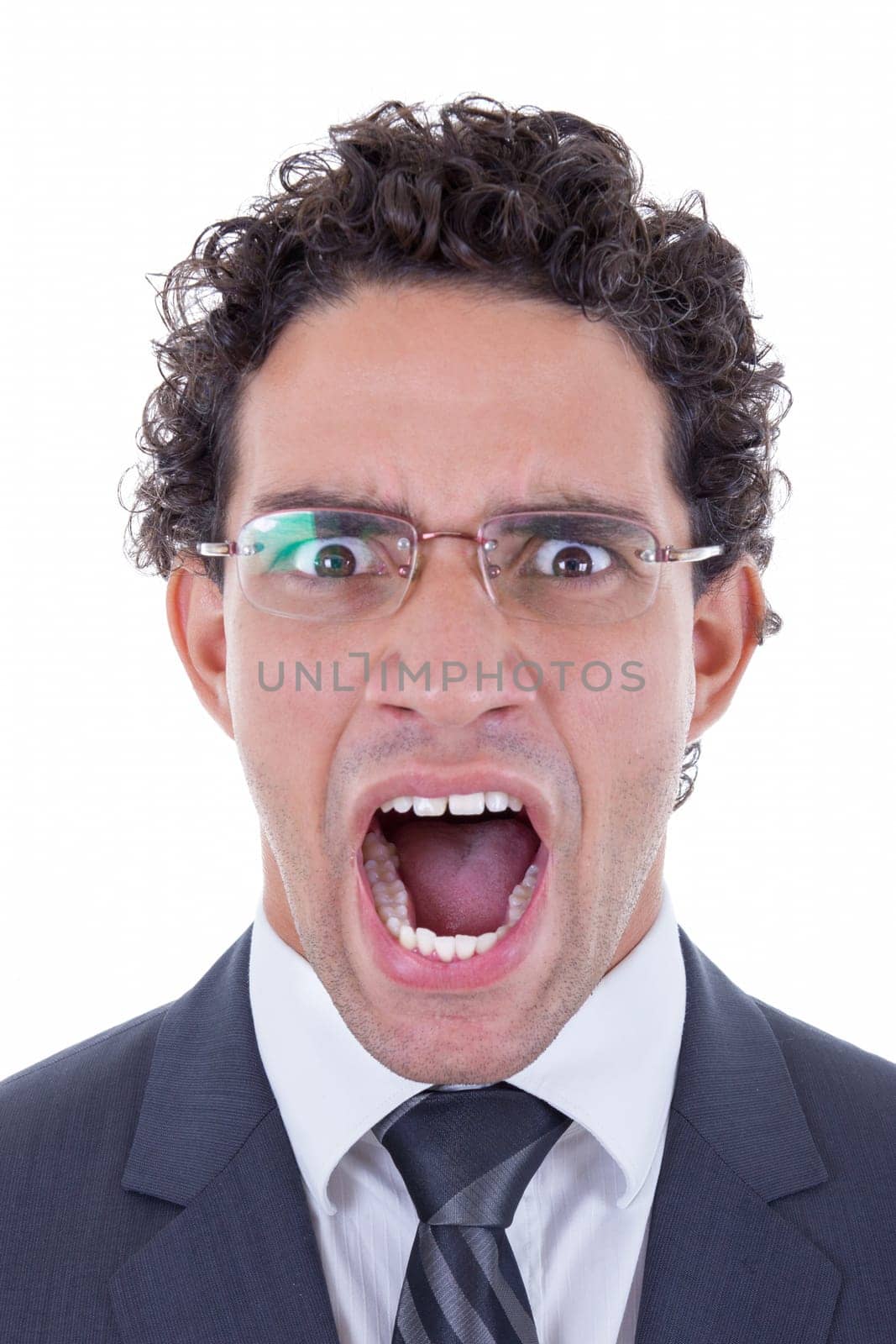 mad young businessman with glasses in suit