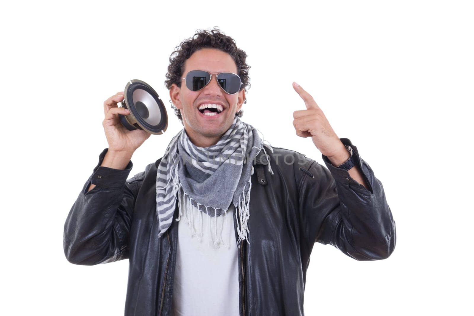 man in a leather jacket with speaker smiling