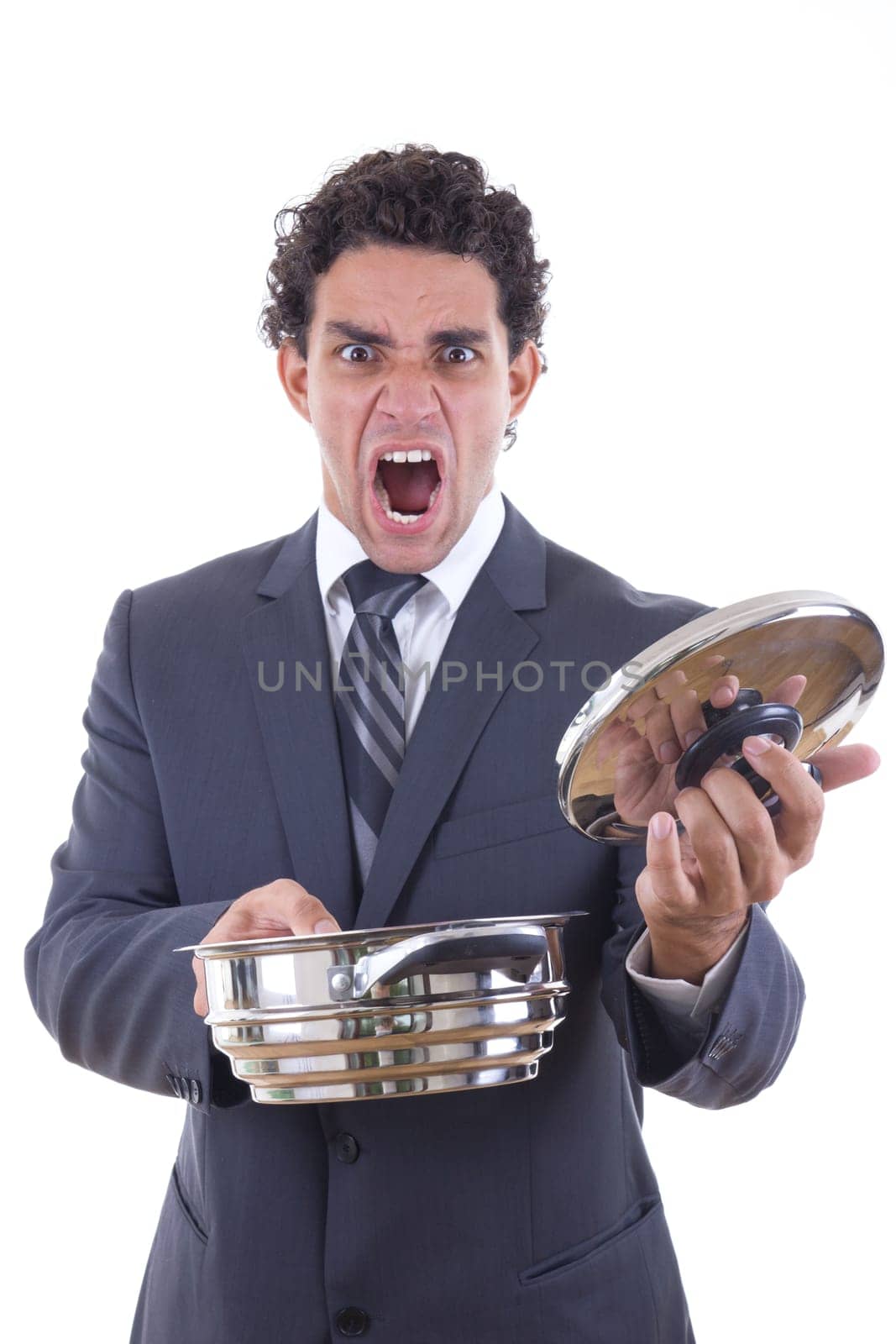 adult dissatisfied man in business suit holding pot for cooking with expression