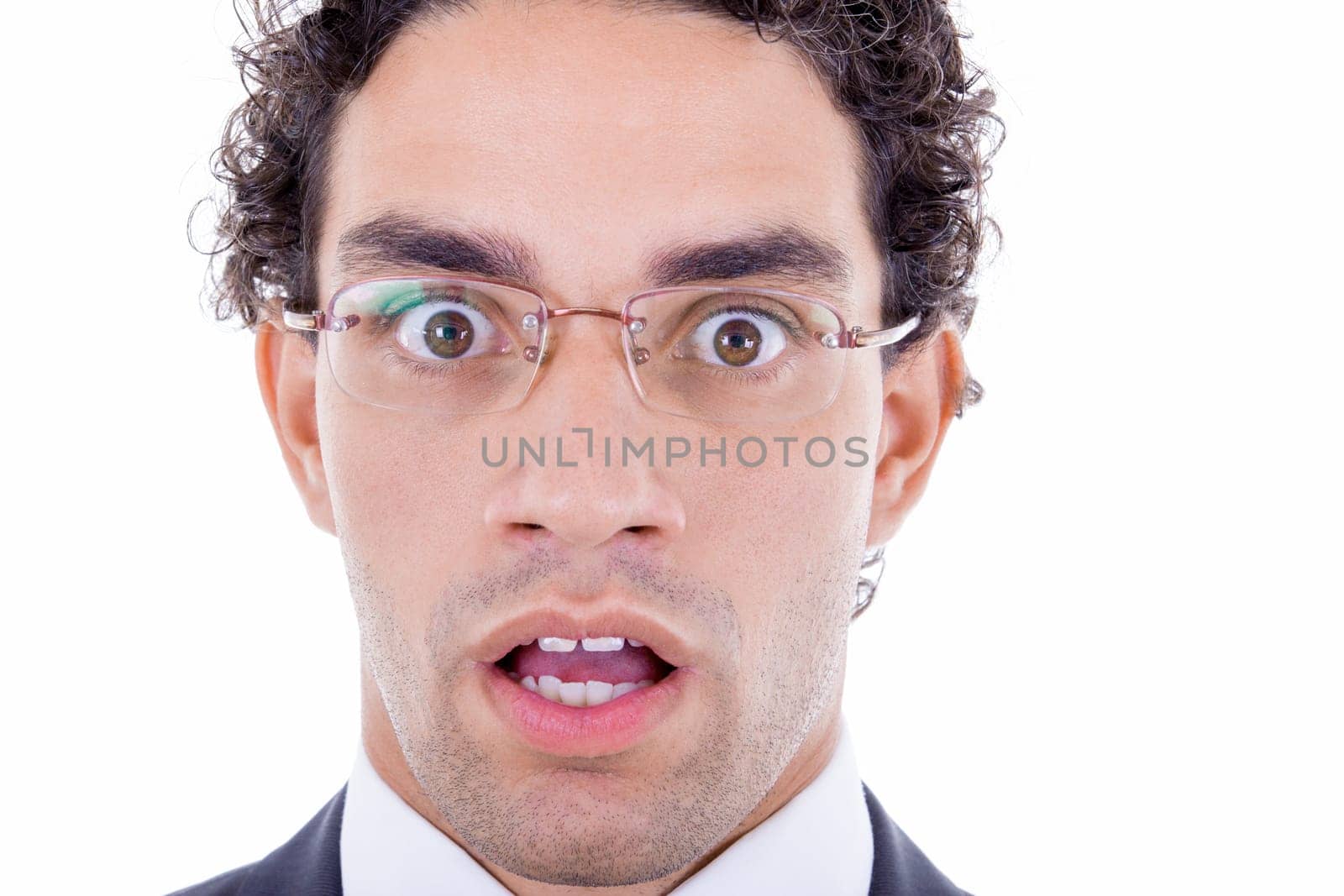 wide eyes open surprised businessman with glasses