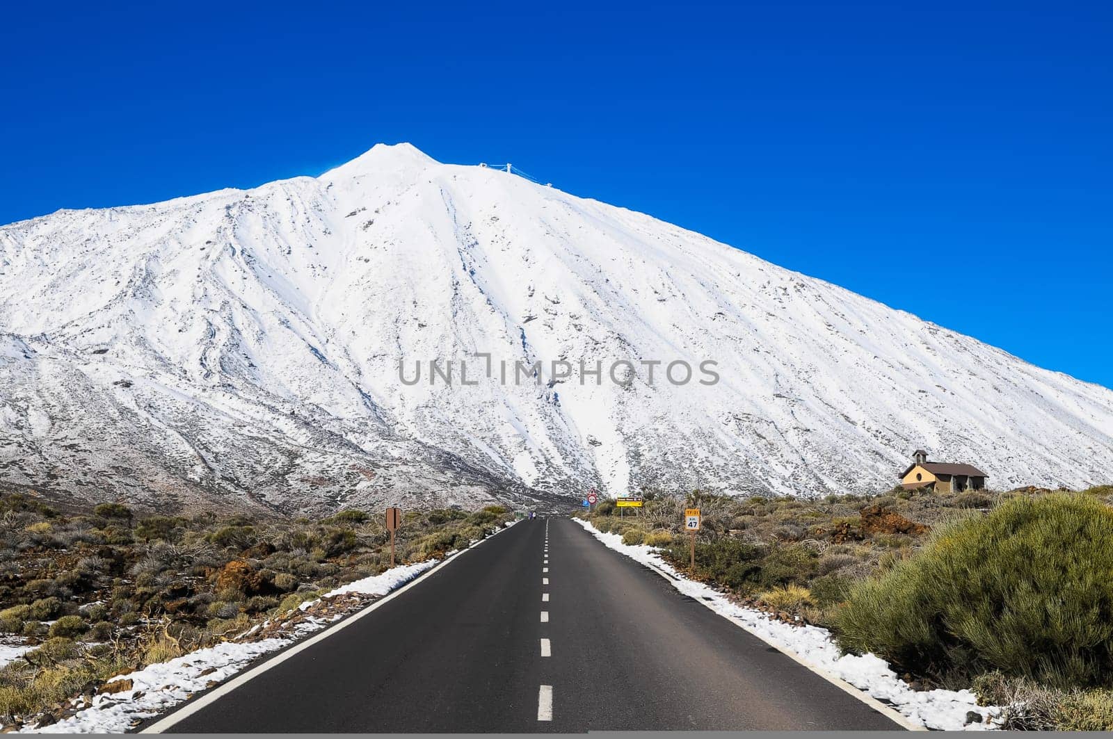 Snow Desert Lonely Road Landscape in Volcan Teide National Park, Tenerife, Canary Island, Spain