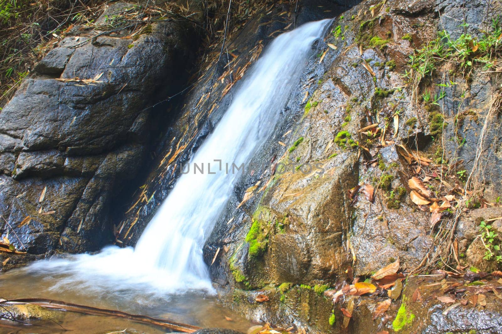 Nature waterfall in deep forest, in national park Thailand