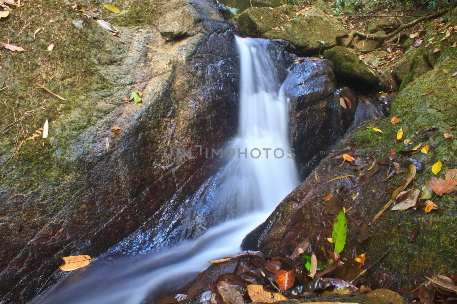 Nature waterfall in deep forest, in national park Thailand