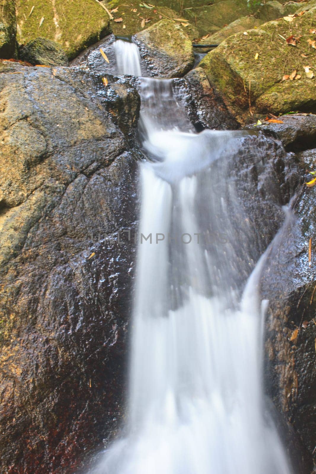 Nature waterfall in deep forest, in national park Thailand