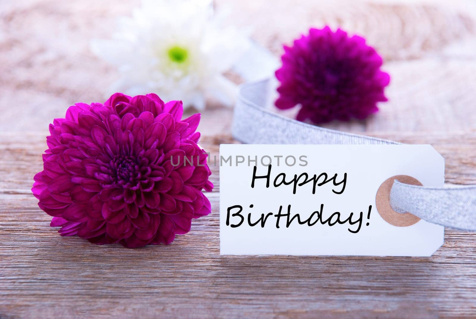 Label with Happy Birthday and Purple and White Flowers