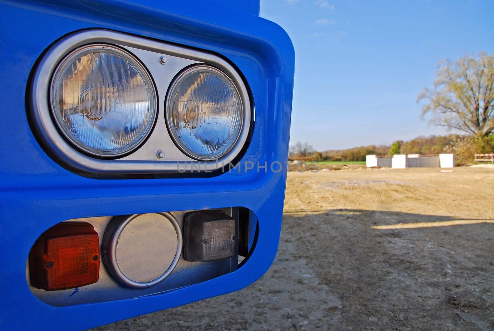 Headlights of a truck on construction site