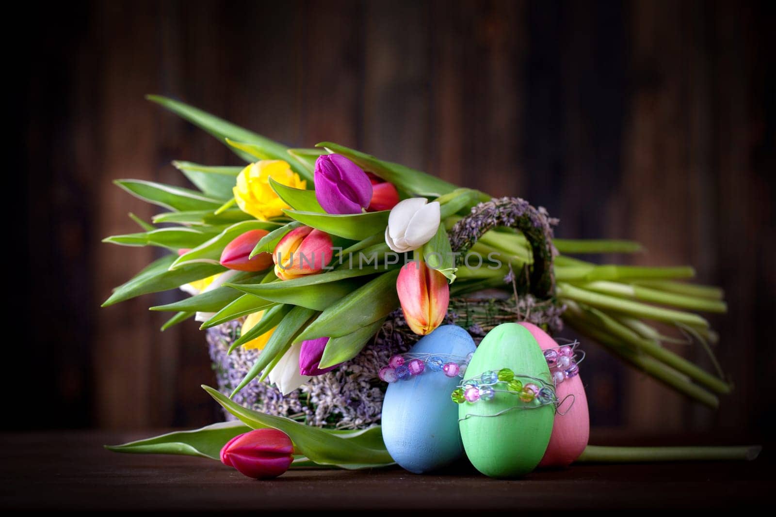 colorful Easter eggs and tulips