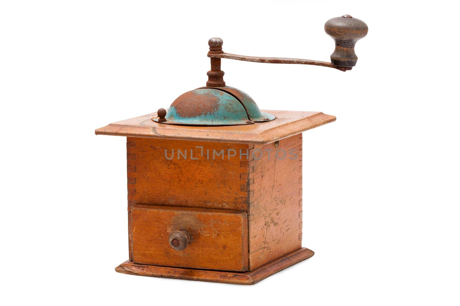 Old nostalgic coffee grinder isolated against a white background