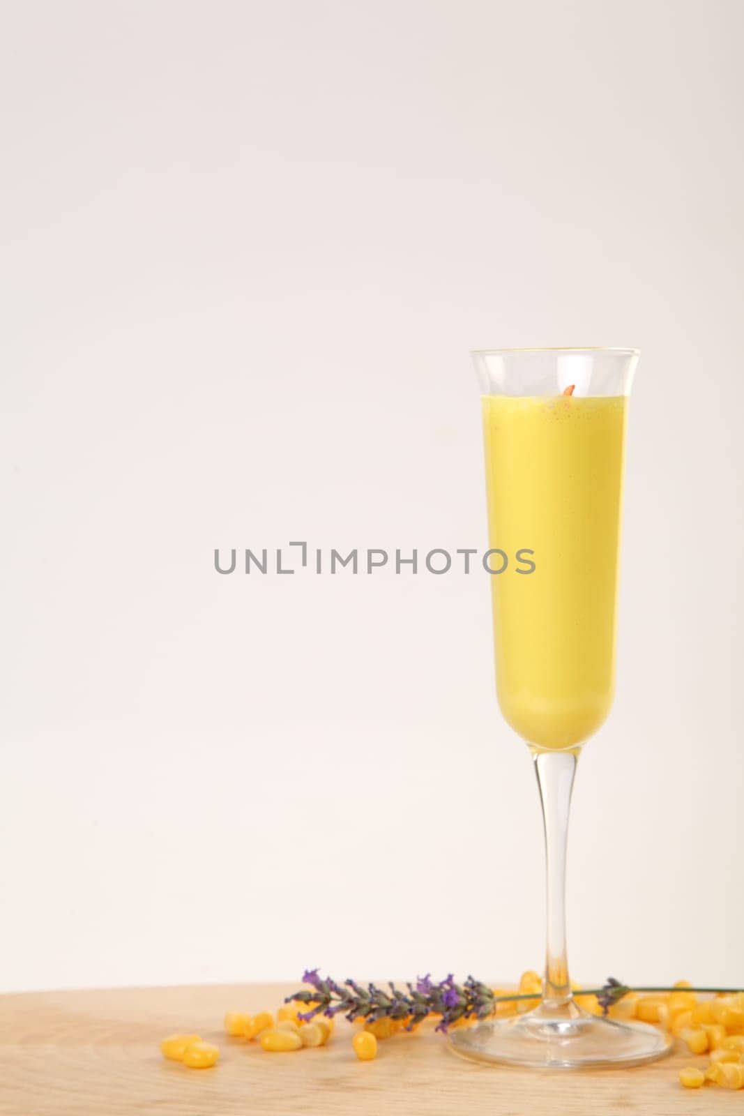 Vertical photo of mais cold soup served in a glass